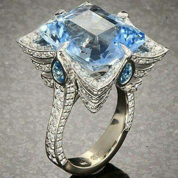 silver ring with big diamond