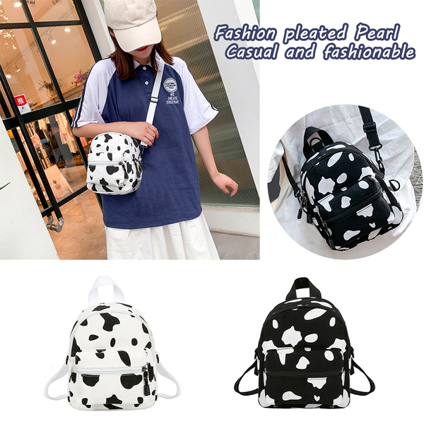 Cow print online backpacks