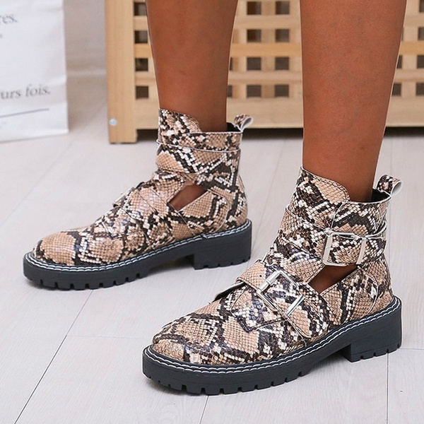 snakeskin flat boots