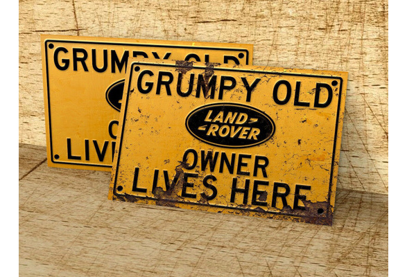 Grumpy old Toyota Land Cruiser owner lives here sign for garage man cave