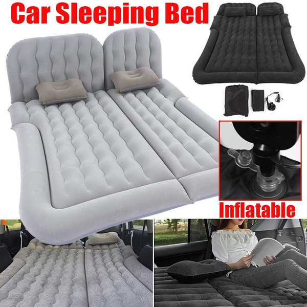 Inflatable bed outlet with headboard