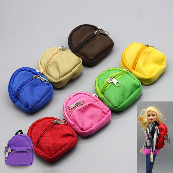 doll in a backpack