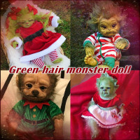realistic grinch baby doll
