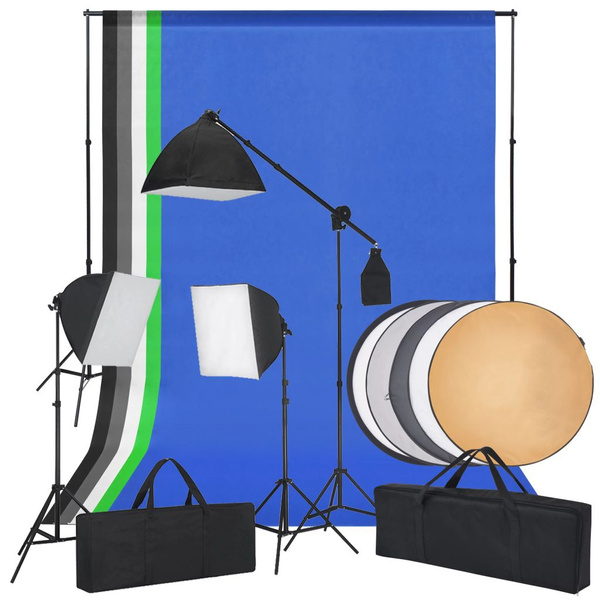 Photo studio set with softbox lights, backgrounds and a reflector