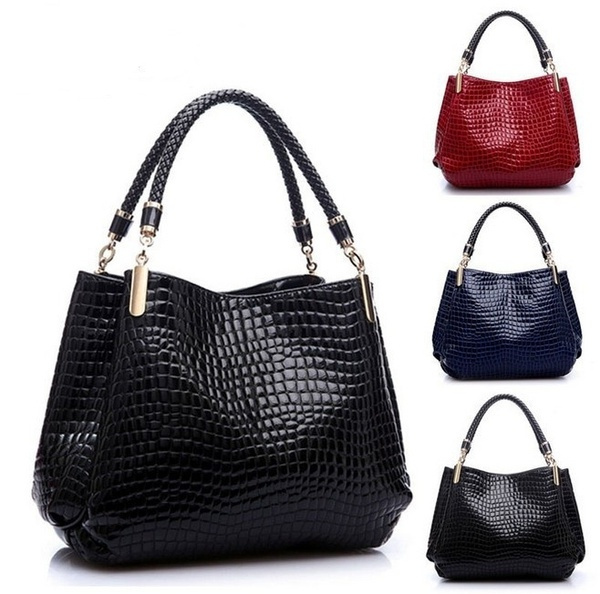 iconic shoulder bolsas