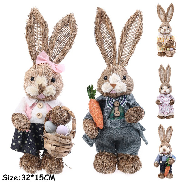 Standing straw rabbit with bow