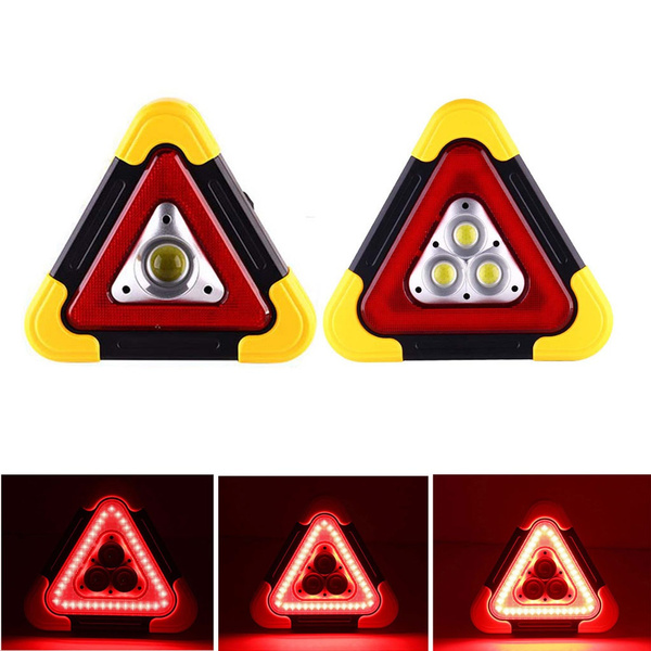 warning lights in a car with triangle symbol codycross