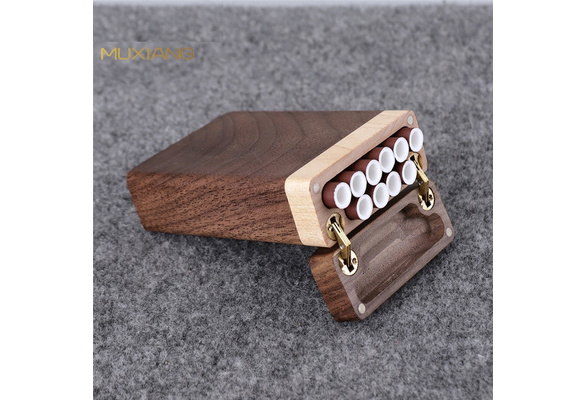two person cigarette holder A couple share a cigarette holder made for two. From a series of... News  Photo
