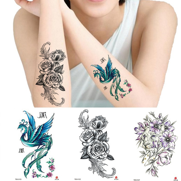 Rising phoenix tattoos with flowers  Phoenix bird tattoos Phoenix tattoo  design Tattoos