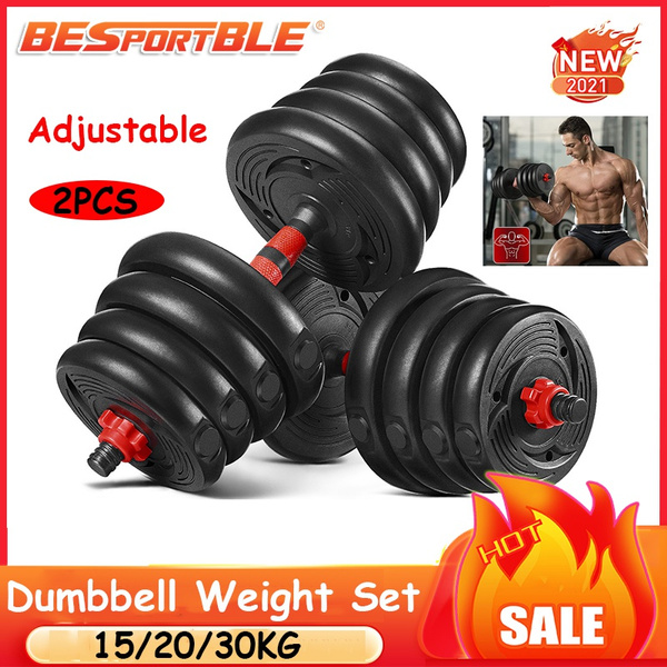 Set of dumbbells and weight. Fitness and bodybuilding equipment