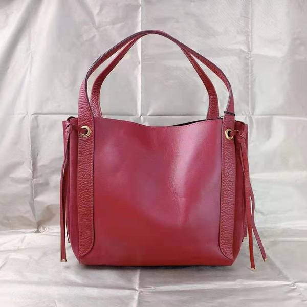 red suede coach purse