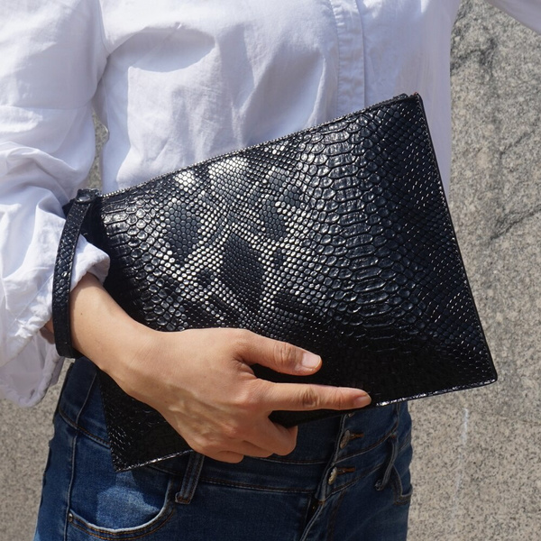 women's clutch with hand strap