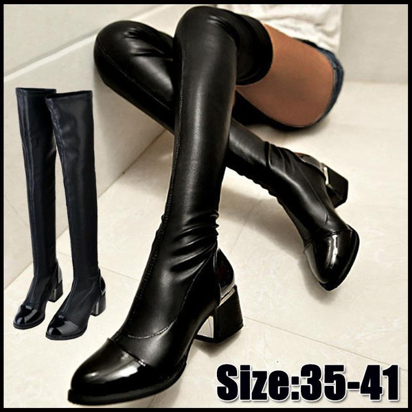 heeled knee high leather boots