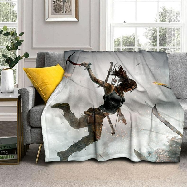 warm-and-stylish-tomb-raider-blanket-with-iconic-game-art-and-logo-wish